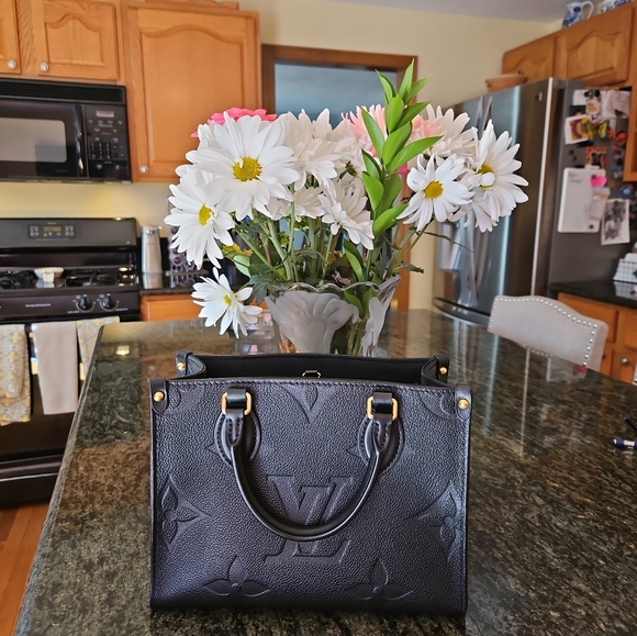 SOLD. Louis Vuitton On The Go PM - Picture 2 of 13